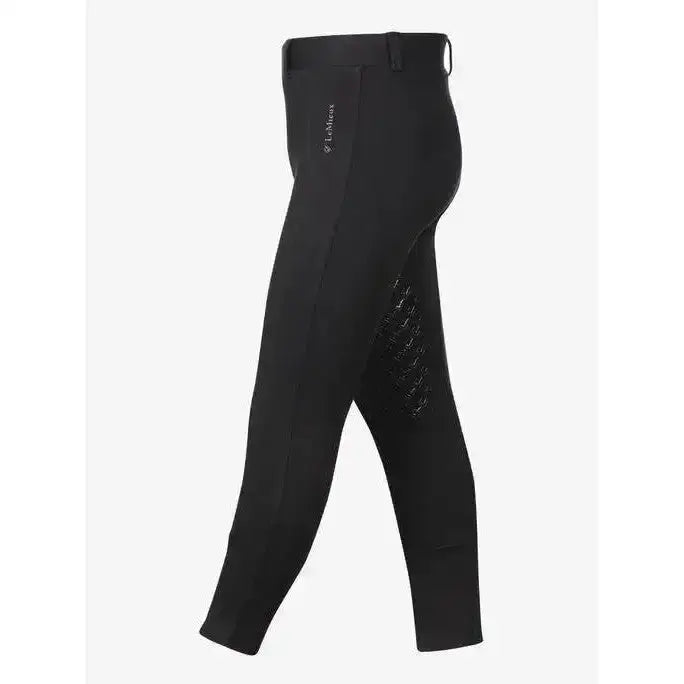 Black lemieux junior pro breeches with tapered lower leg and subtle thigh texture perfect for young riders