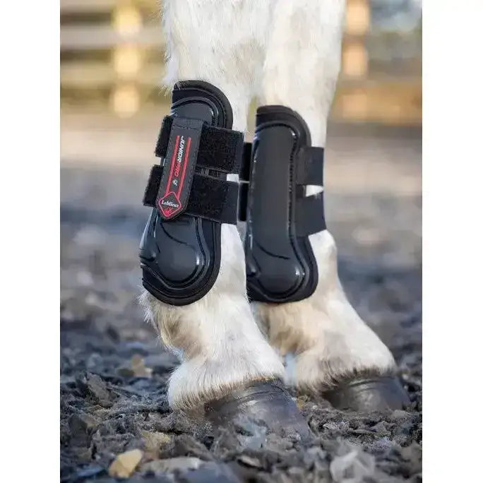 Black lemieux junior pro tendon boots with red branding and adjustable velcro straps from the junior pro collection