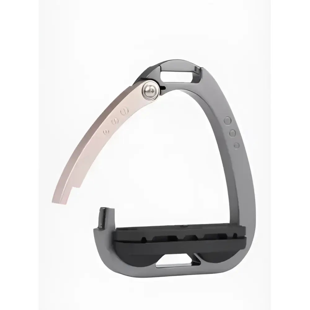 Gray and black metal bicycle pedal with sleek design featured on lemieux junior vector balance stirrup rose gold