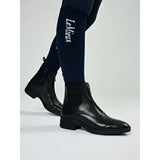 Black leather lemieux junior zip paddock boot with zipper closure and subtle stitching details in paddock boot black