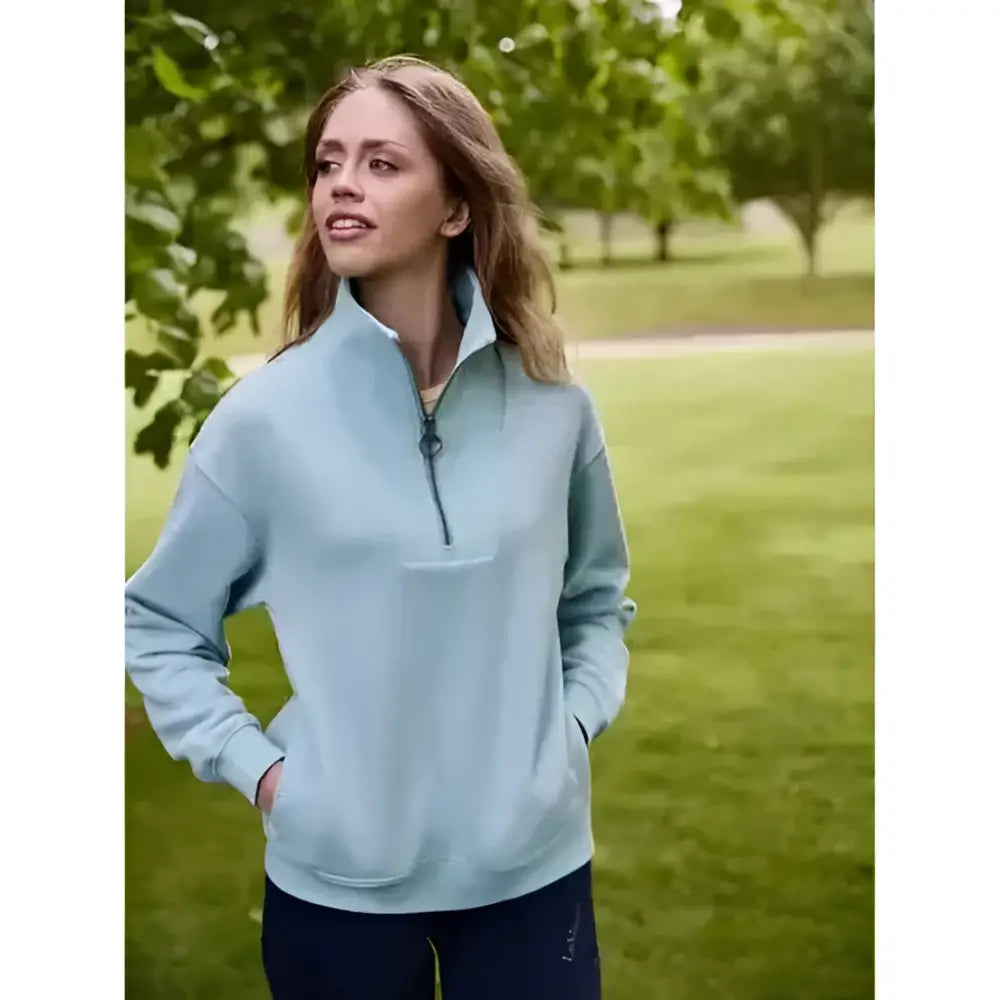 Light blue lemieux keira quarter neck sweat with half zip, front pocket, and ribbed cuffs perfect for layering