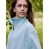 Light blue lemieux keira quarter zip-up fleece jacket with high collar and subtle stitching details