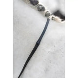 Black leather belt with subtle stitched detail near buckle for lemieux kris extreme rubber and extreme rubber reins