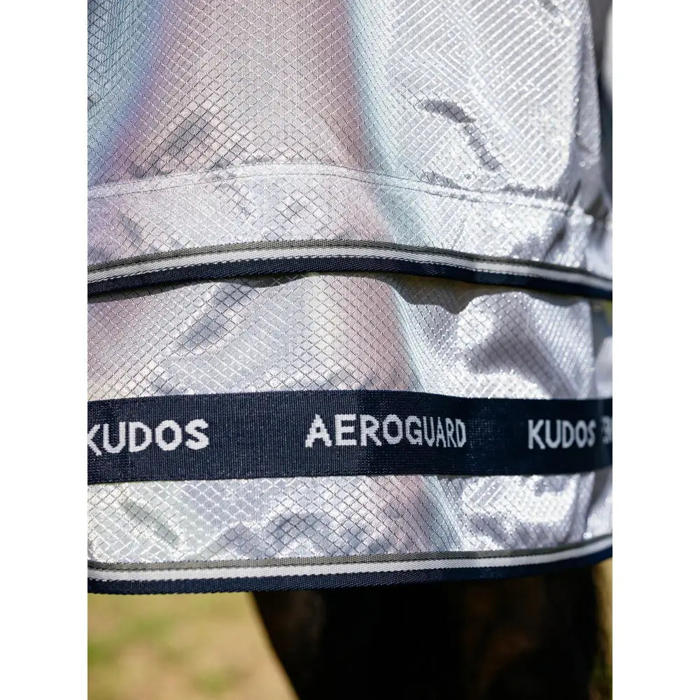 Silver reflective mesh horse fly sheet with black trim and kudos aeroguard branding from lemieux kudos aeroguard fly rug