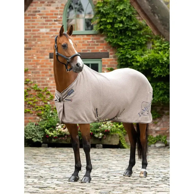 Beige textured lemieux kudos bamboo cooler pecan horse blanket with black trim silver hardware and logo on the side
