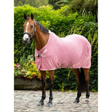 Pink corduroy horse blanket with white logo on the side lemieux kudos bamboo cooler peony design
