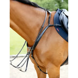 Black leather kudos bridge breastplate havana with silver hardware shown with navy blue lemieux kudos bridge saddle pad
