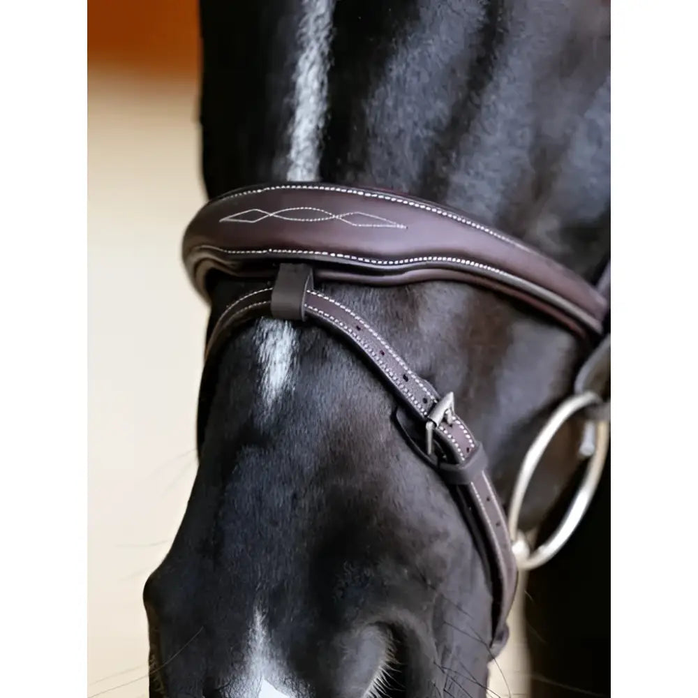 Brown leather lemieux kudos contour flash bridle with white stitching and decorative wave pattern