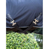 Horse blanket with crossed straps and buckles from Lemieux Kudos Hybrid Cooler Navy