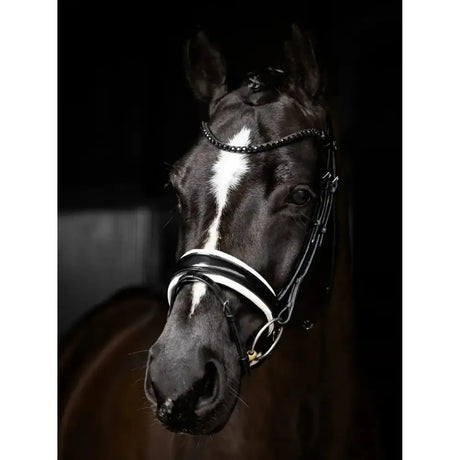 Black and white lemieux kudos patent dressage bridle with braided chain detail for stylish riding gear