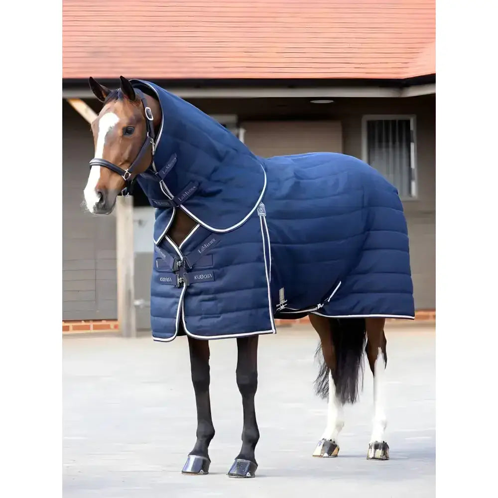 Navy blue quilted lemieux kudos stable neck cover with white trim and black buckles for horses 200g warmth