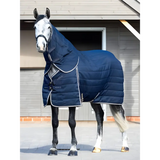 Horse in a Lemieux Kudos Stable Neck Cover 50g Navy blanket and hood for winter