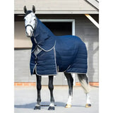 Navy blue quilted lemieux kudos stable neck cover with white trim and front zipper closure for horses