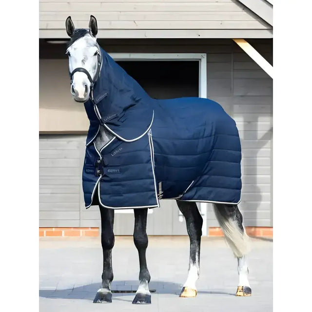 Navy blue quilted lemieux kudos stable neck cover with white trim and front zipper closure for horses