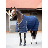 Navy blue lemieux kudos stable rug 100g with white trim rip stop outer and brand logo for horse use
