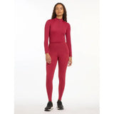 Red long-sleeved bodysuit worn by a woman featuring Lemieux Ladies Base Layer Ember