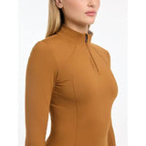 Mustard long-sleeved athletic top, Lemieux Ladies Base Layer Ginger with quarter-zip collar