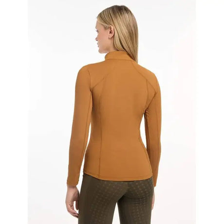 Mustard-colored turtleneck sweater worn by a woman, Lemieux Ladies Base Layer Ginger