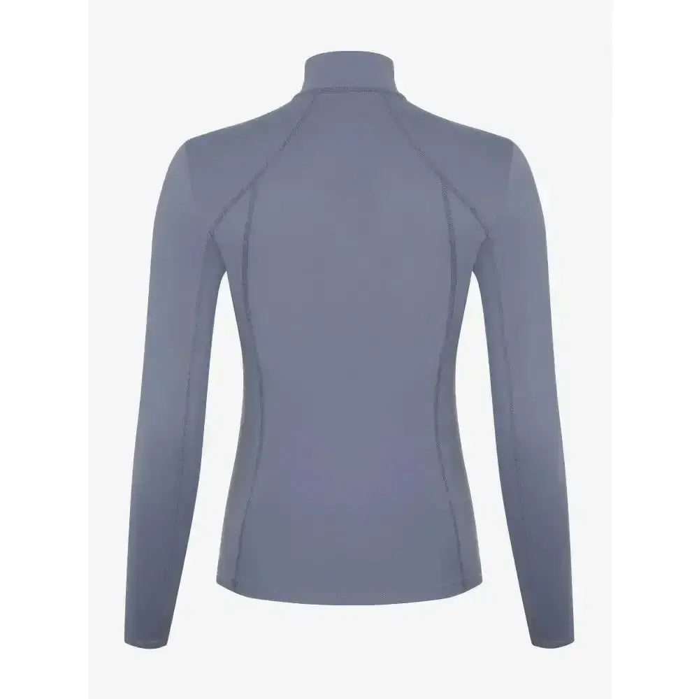 A sleek gray high-neck long-sleeved rash guard with subtle seams in the lemieux ladies base layer jay blue collection