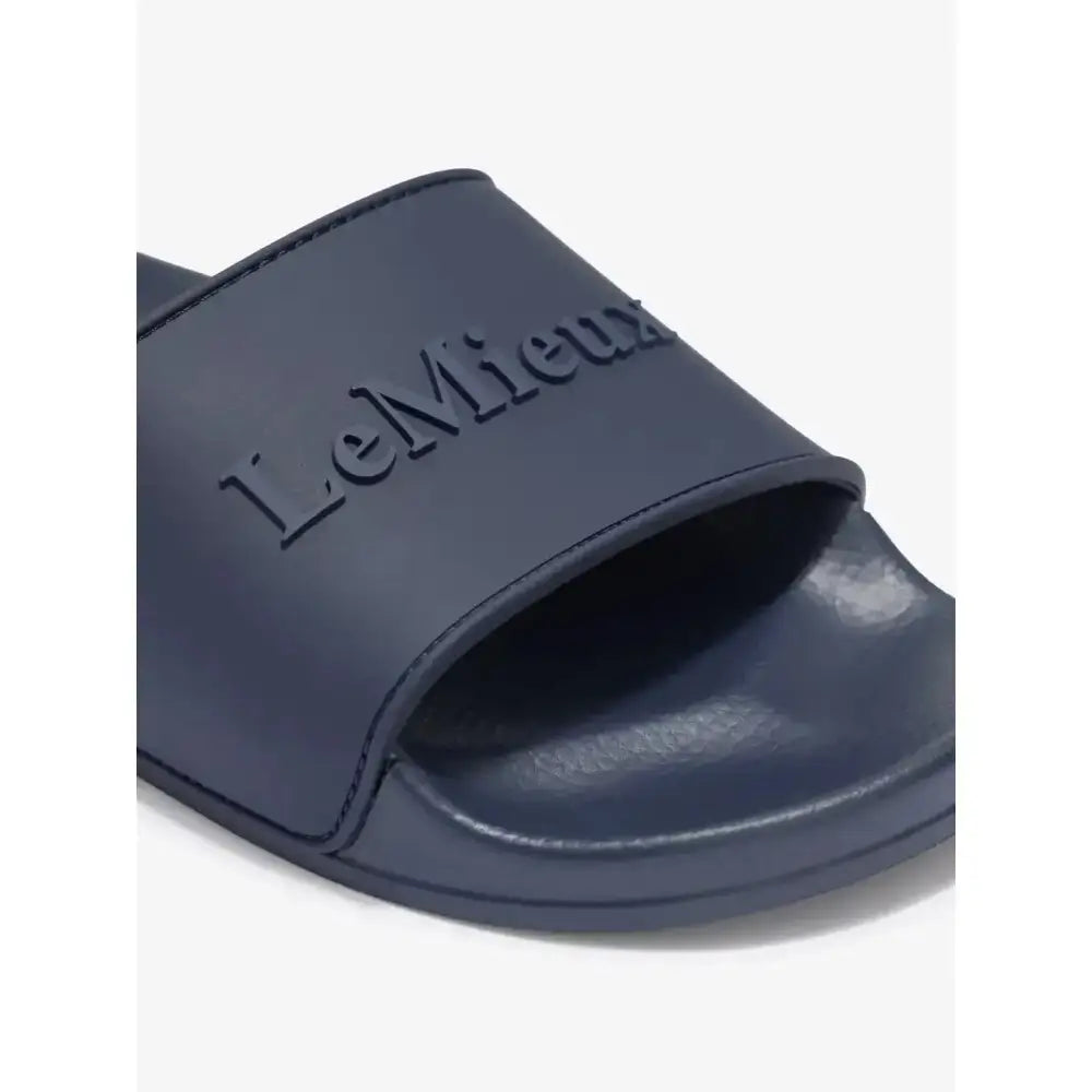 Navy blue rubber lemieux ladies sliders dusk with embossed branding comfy and casual for everyday wear