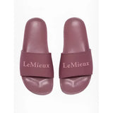 Pair of mauve lemieux ladies sliders with soft textured strap featuring lemieux logo in matching rosewood tone