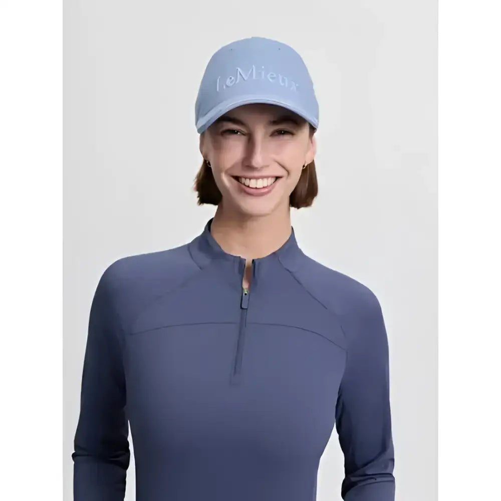 Light blue lemieux lara cap with embroidered logo cotton twill fabric and metal slide adjuster for a comfy fit
