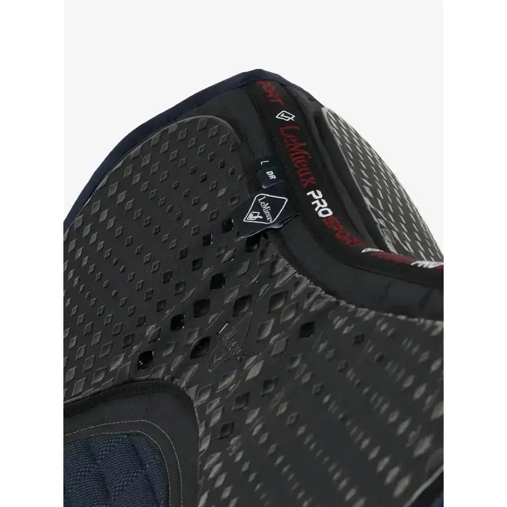 Black and gray patterned lattoir pro protective knee pad with textured perforated surface for lemieux le cool grip dressage pad navy