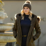 Olive green parka with fur lined hood and black inner lining perfect for pairing with lemieux lila beanie alpine
