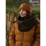 A warm mustard-yellow puffer jacket with quilted design and zipper paired with lemieux lila headband ginger