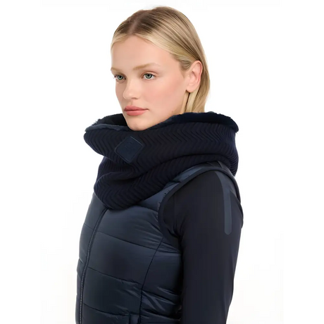 Woman in a dark blue winter coat and thick scarf featuring Lemieux Lila Snood Navy