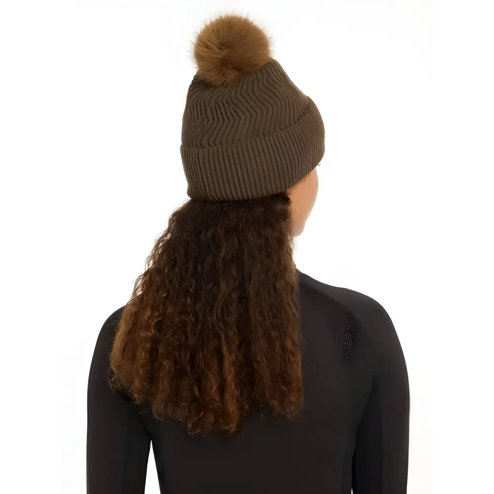 Knitted brown Lemieux LM Beanie Alpine with a fluffy faux fur pom-pom on top