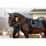 Blue lemieux loire classic dressage pad with woven satin fabric and black leather stirrup with silver hardware
