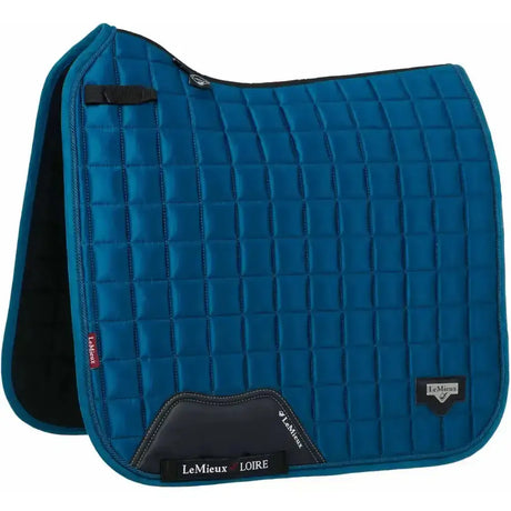 Blue quilted lemieux loire classic satin dressage square with black trim and branding marine color