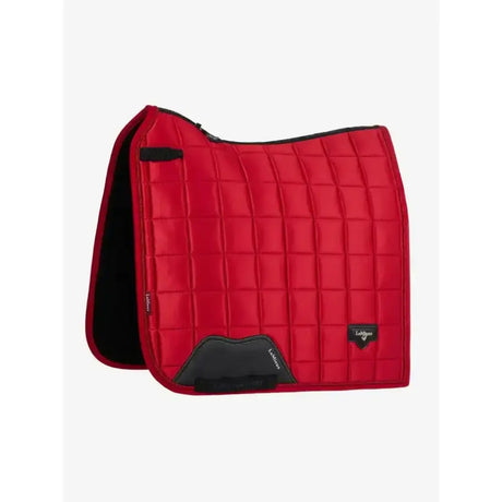 Red quilted lemieux loire dressage square chilli saddle pad with black trim and branded logo patch, stylish dressage pad