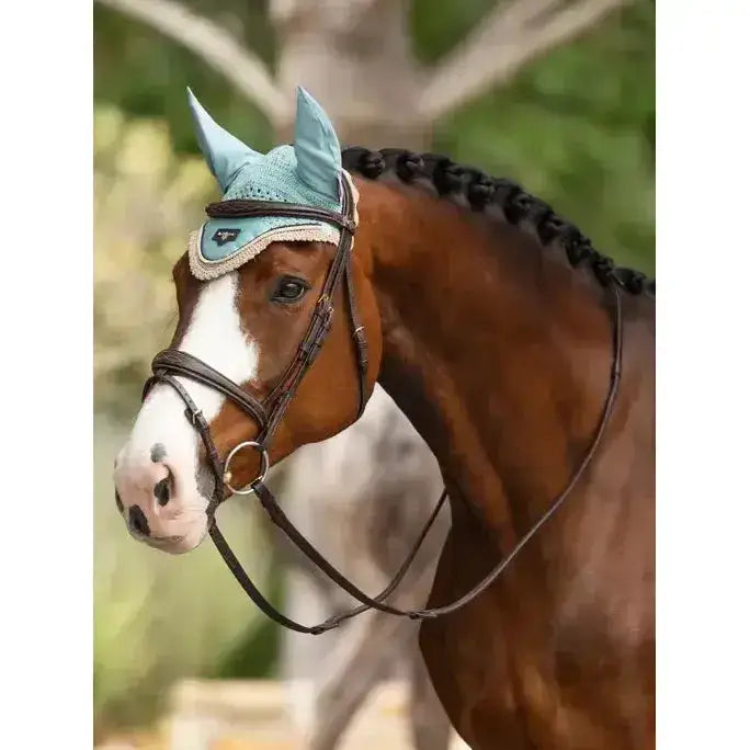 Light blue crocheted lemieux loire fly hood aqua with white trim and small logo on the forehead