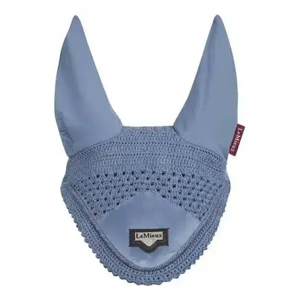 Light blue crocheted lemieux loire fly earring cover with smooth fabric lining and embroidered brand tag