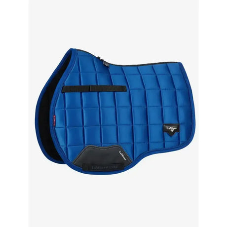 Blue quilted lemieux loire gp square saddle pad with black trim and branding for riding comfort