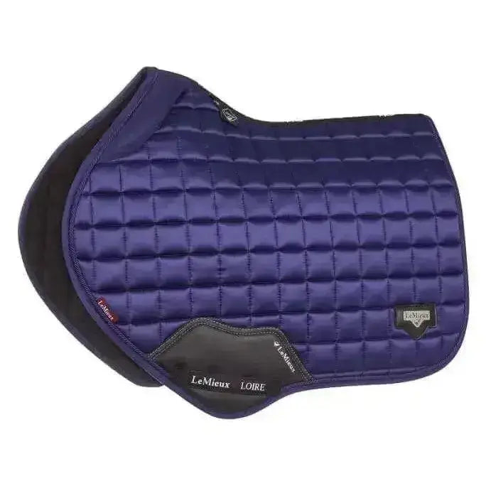Deep purple quilted lemujeux loire memory close saddle pad with black trim and branded patch for close contact use