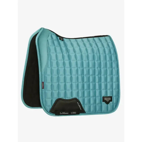 Teal lemieux loire memory dressage square with quilted texture black trim and branded patch for riding use