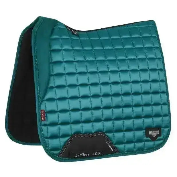 Teal quilted lemieux loire memory dressage square peacock saddle pad with black trim and branding