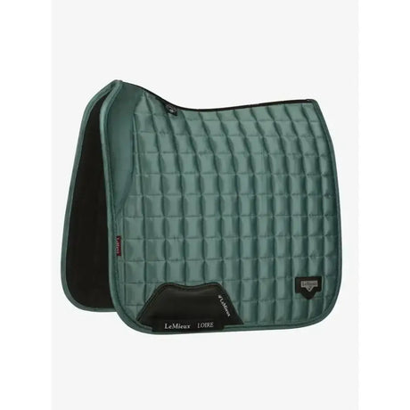Teal quilted lemieux loire memory dressage saddle pad with black trim and branding for memory dressage square use