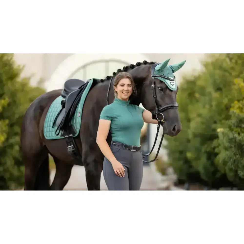 Teal lemieux loire memory dressage tack set with matching saddle pad and bridle featuring decorative stitching