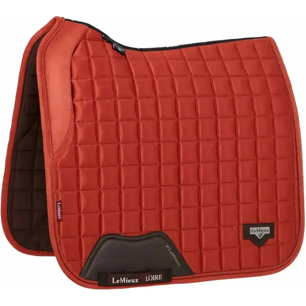 Red quilted lemieux loire memory satin dressage square saddle pad with black accents and lemieux logo in sienna