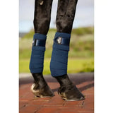 Navy blue lemieux loire polo bandages atlantic with adjustable wraparound straps and branded patch from the loire collection