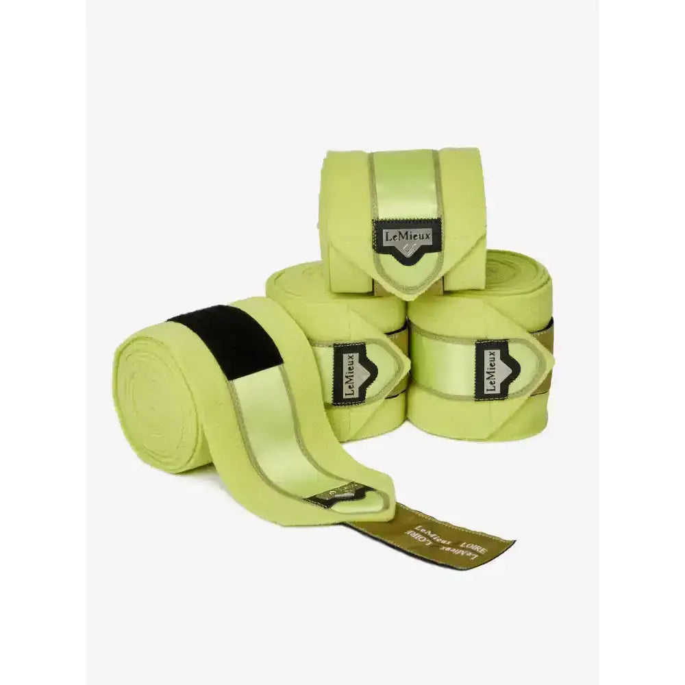 Lime green lemieux loire polo bandages with black elastic band and satin finish from the loire collection for exercise use