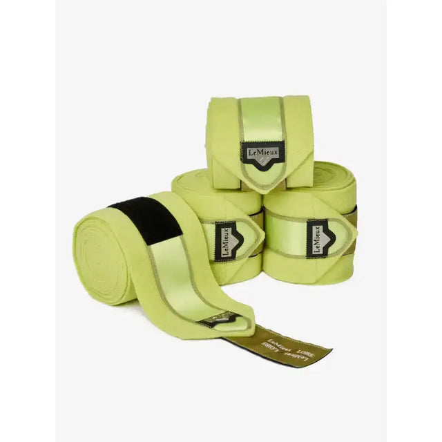 Lime green lemieux loire polo bandages with black elastic band and satin finish from the loire collection for exercise use