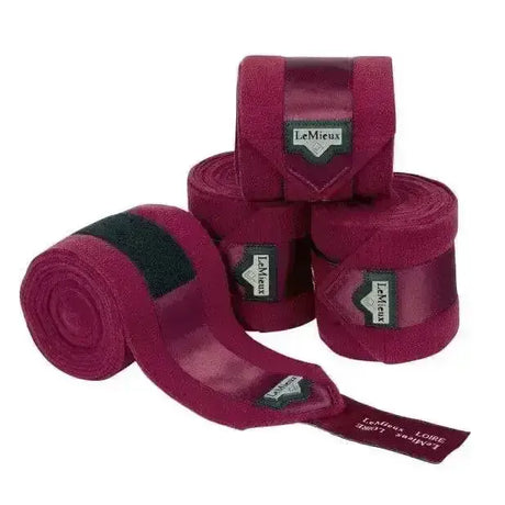 Maroon lemieux loire polo bandages mulberry rolls with black velcro straps and branded labels for horses