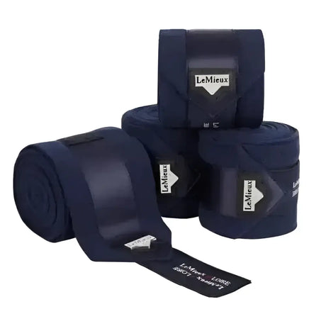Navy blue lemieux loire polo bandages in soft fleece rolls from the loire collection perfect for horse leg support