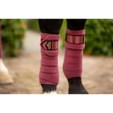 Pink fleece lemieux loire polo bandages with metallic buckle and logo perfect exercise bandages for horses