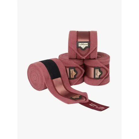 Pink plush lemieux loire polo exercise bandages with black elastic and lemieux label for secure wrapping